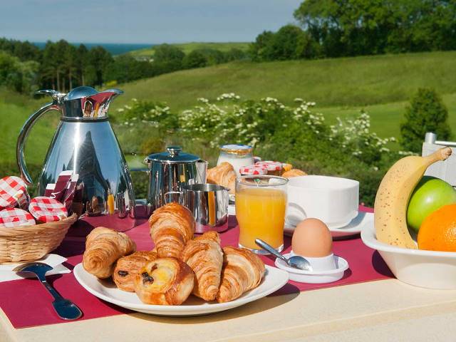 Mercury Omaha Beach frankrijk normandie golf reis ontbijt